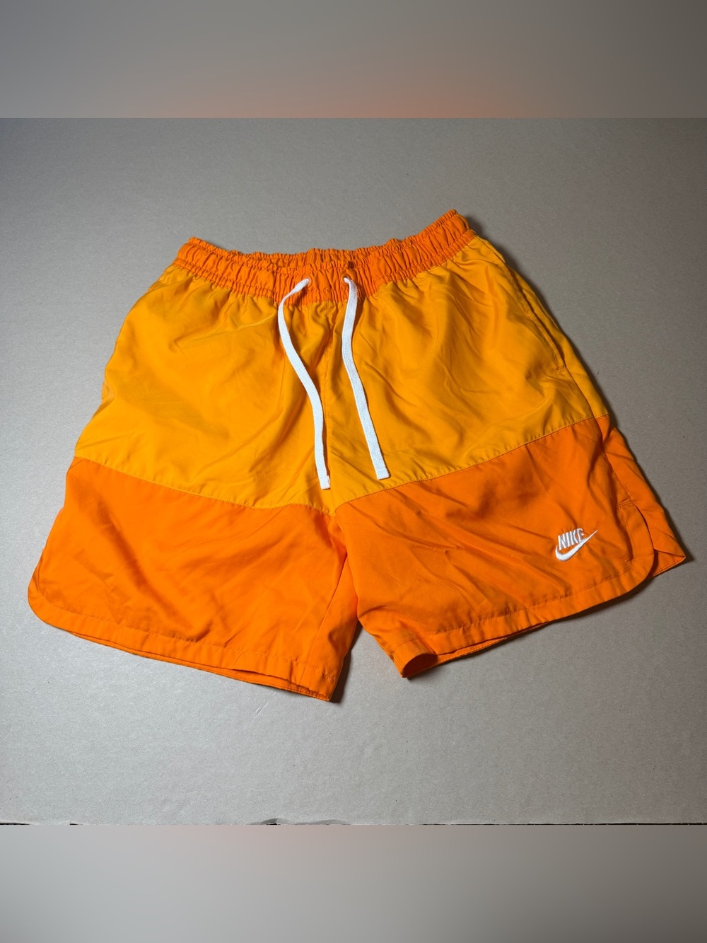 Nike mens colorblock lined flow shorts orange long shorts size M 7 inch inseam
